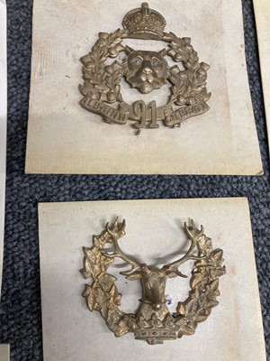 Lot 60 - Cap Badges. A collection of military cap badges