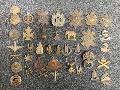 Lot 61 - Cap Badges. Victorian and WWI regimental cap badges