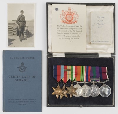 Lot 216 - WWII Medals. A WWII group of seven to Flight Sergeant T. Walker, Royal Air Force