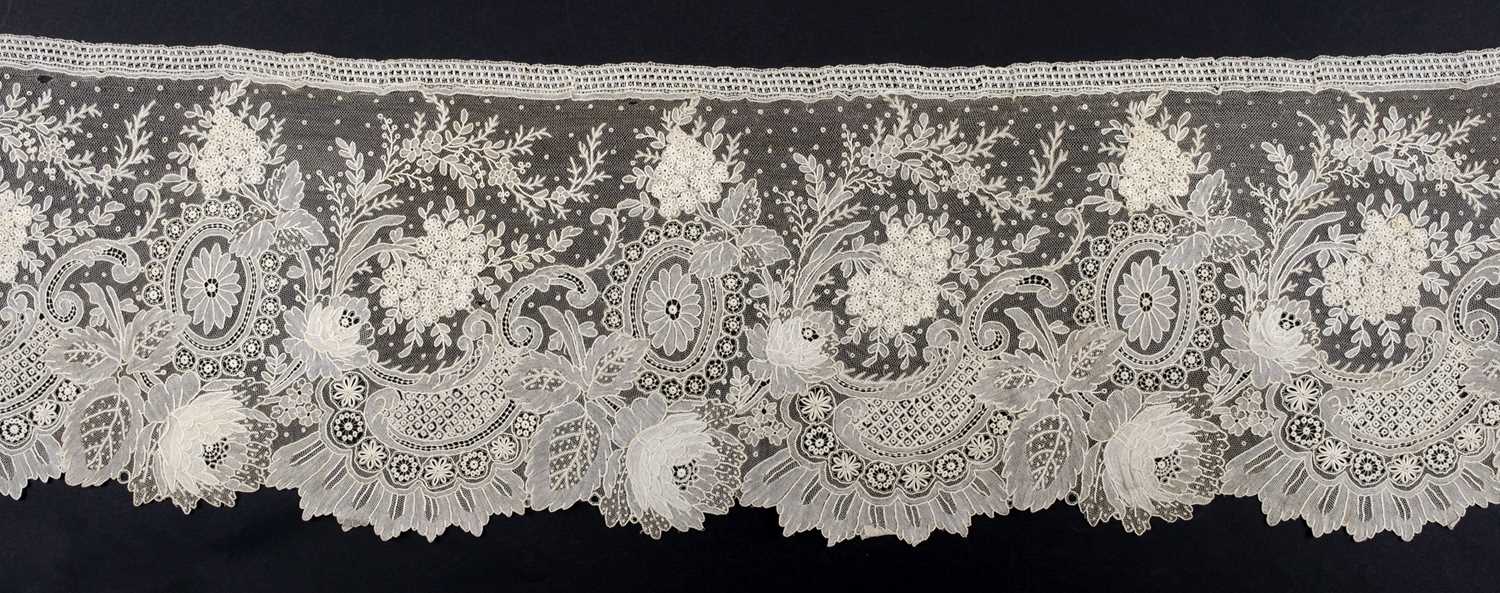 Lot 555 - Lace. A large flounce of Point de Gaze needlelace, Brussels, circa 1880