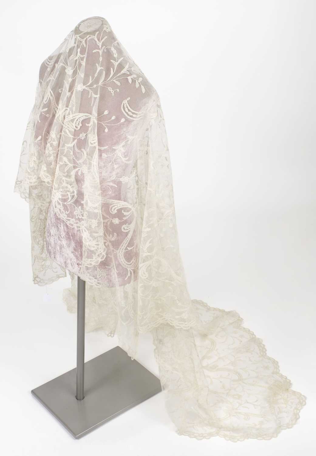 Lot 548 - Lace. A Brussels lace cream veil, early 20th century