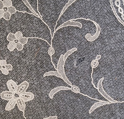 Lot 548 - Lace. A Brussels lace cream veil, early 20th century