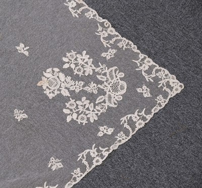 Lot 548 - Lace. A Brussels lace cream veil, early 20th century