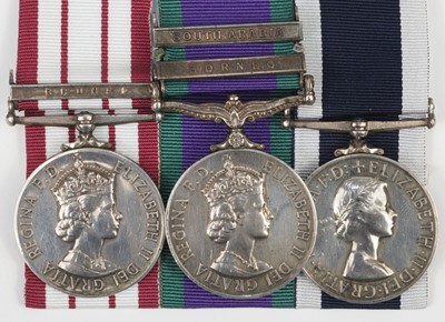 Lot 205 - Three: Corporal C. Brooks, Royal Marines