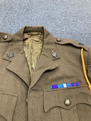 Lot 98 - Queen's Regiment. Uniforms and accoutrements