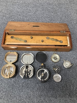 Lot 63 - Compasses. A Watts & Sons Ltd London brass compass, circa 1920 and other compasses