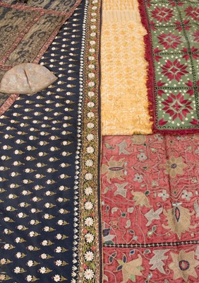 Lot 412 - Asian. A collection of embroidered and woven textiles, 19th-early 20th century