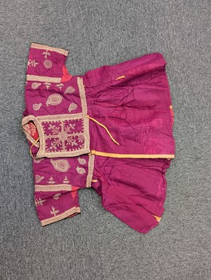 Lot 412 - Asian. A collection of embroidered and woven textiles, 19th-early 20th century