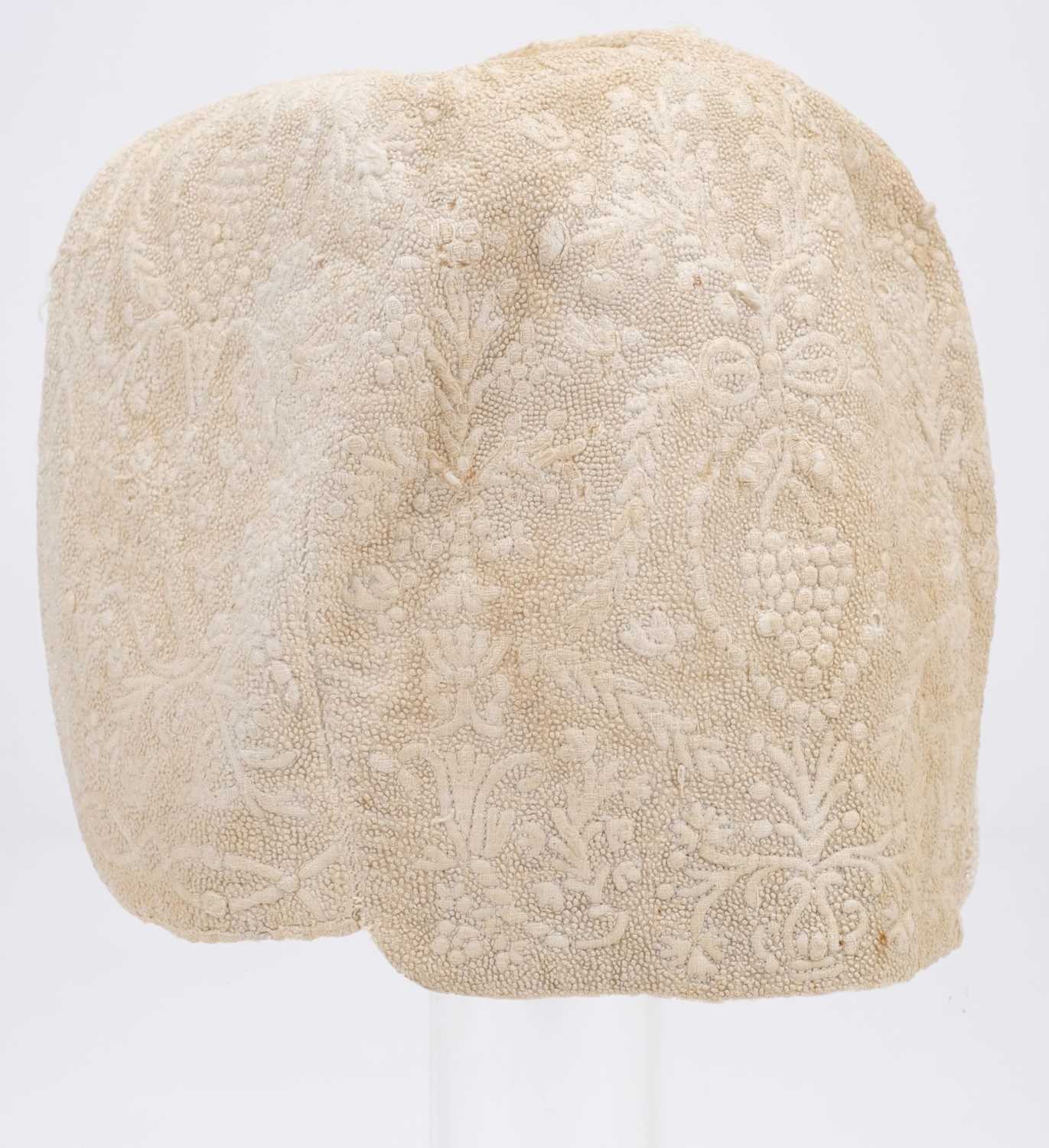 Lot 528 - Clothing. A fine needlework infant's cap, early 18th century