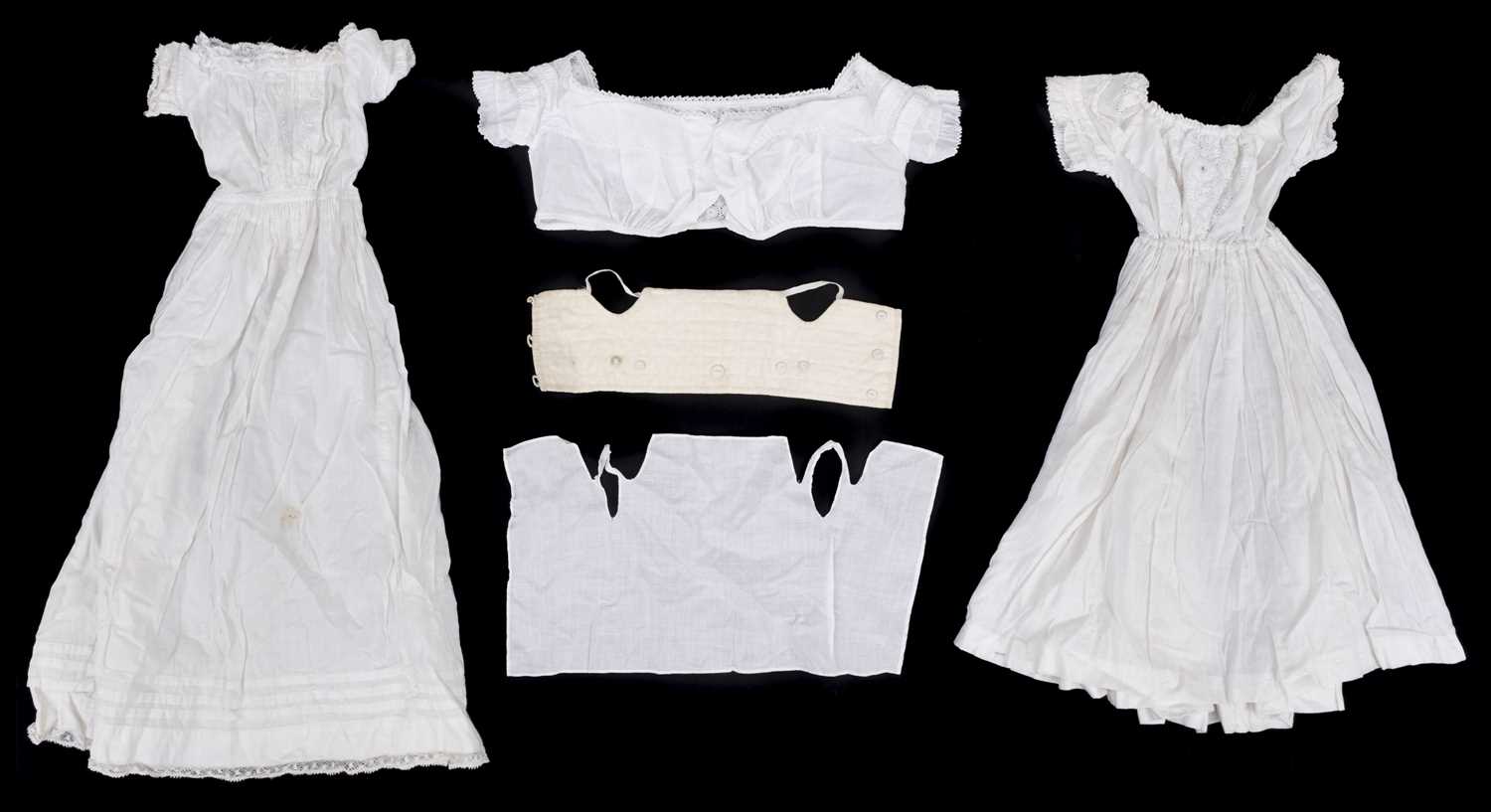 Lot 527 - Clothing. A collection of Victorian and Edwardian dolls' and infants' clothes