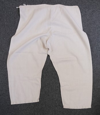 Lot 534 - Clothing. A Ukrainian linen smock, early 20th century, & other items