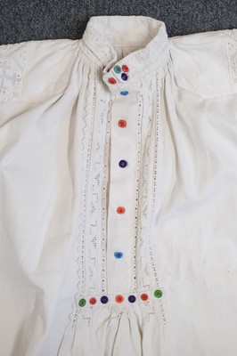 Lot 534 - Clothing. A Ukrainian linen smock, early 20th century, & other items