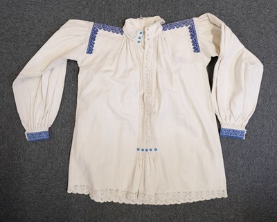 Lot 534 - Clothing. A Ukrainian linen smock, early 20th century, & other items