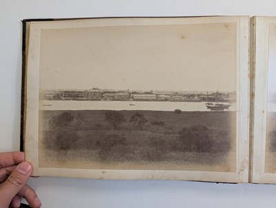 Lot 12 - China. An album of 24 photographs of Shanghai and Peking, c. 1870s/1880s