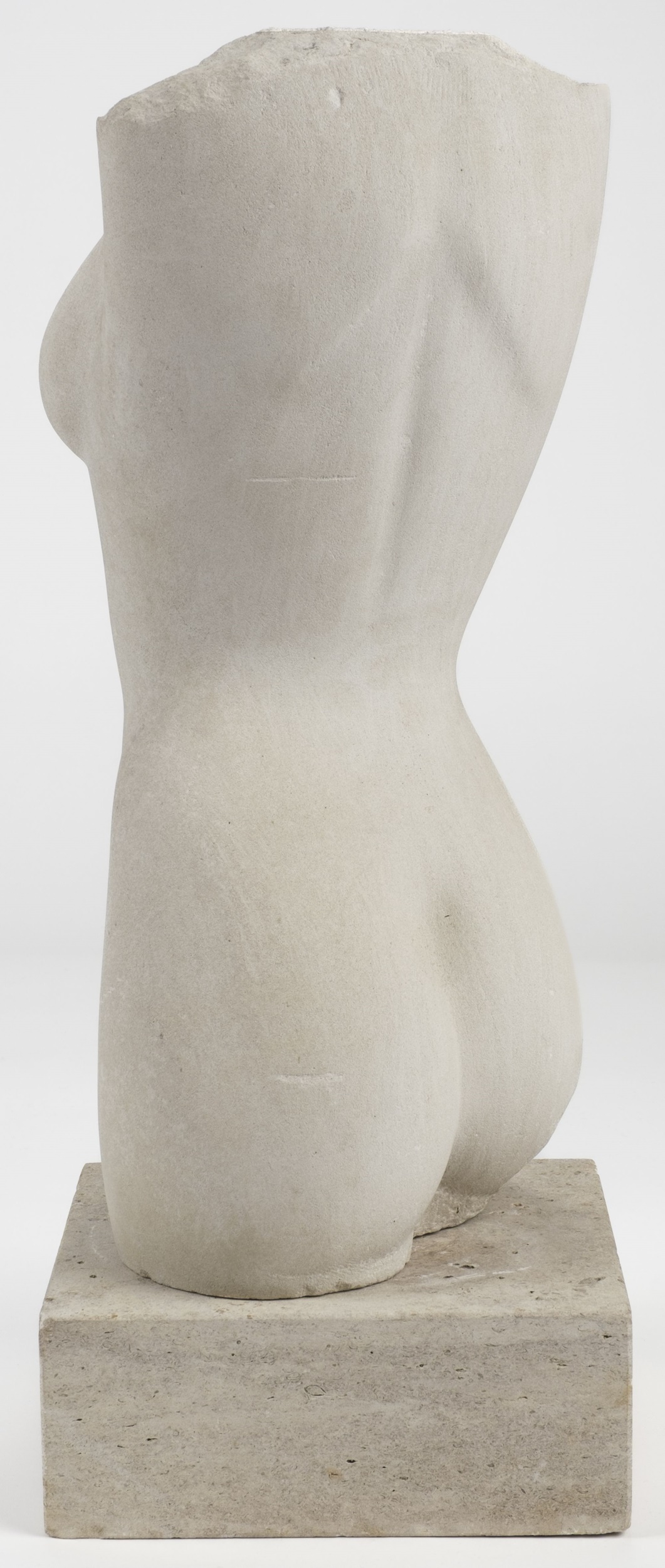 Lot 739 - Stone Torso. A limestone carved female torso,