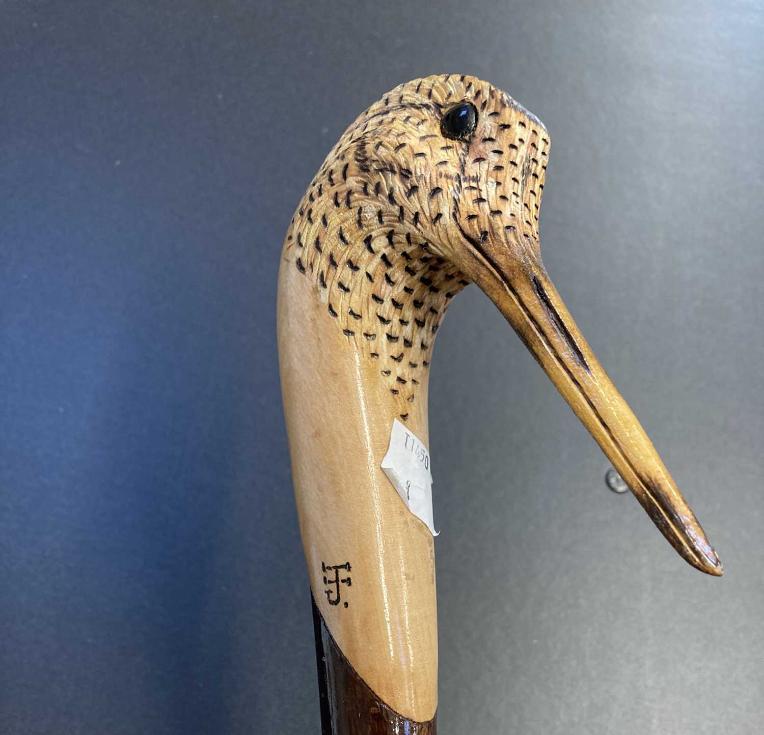 Lot 743 - Walking Stick. A walking stick with woodcock terminal, hand carved by Ian James
