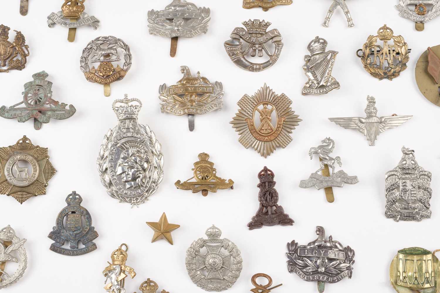 Lot 231 - Cap Badges. A collection of military cap badges, mostly line regiments and corps