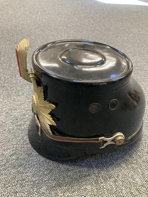 Lot 235 - Helmet. A West German Police shako by Friedrich Becker & Co, Berlin