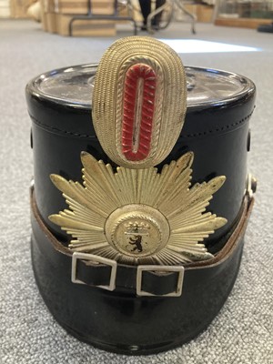 Lot 235 - Helmet. A West German Police shako by Friedrich Becker & Co, Berlin