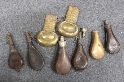 Lot 305 - Powder Flask. A Victorian copper and brass bag form powder flask by W. Bartram