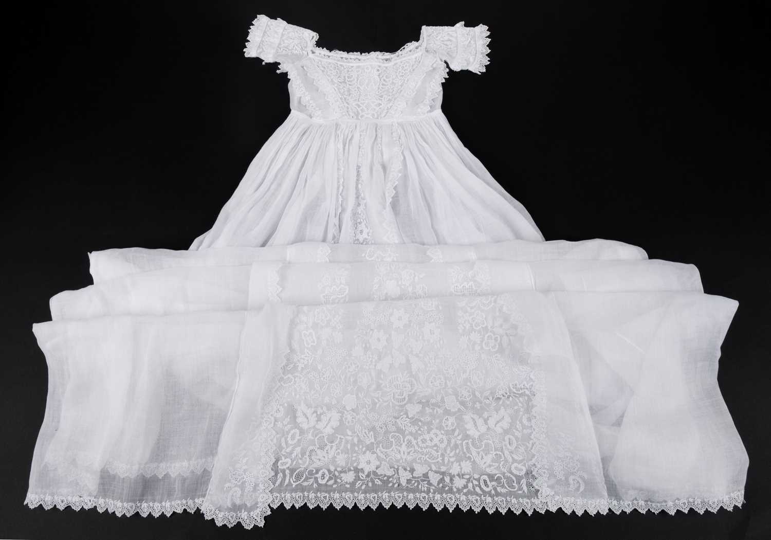 Lot 439 - Embroidery. A fine Ayrshire work christening gown, circa 1850s, & other whitework garments
