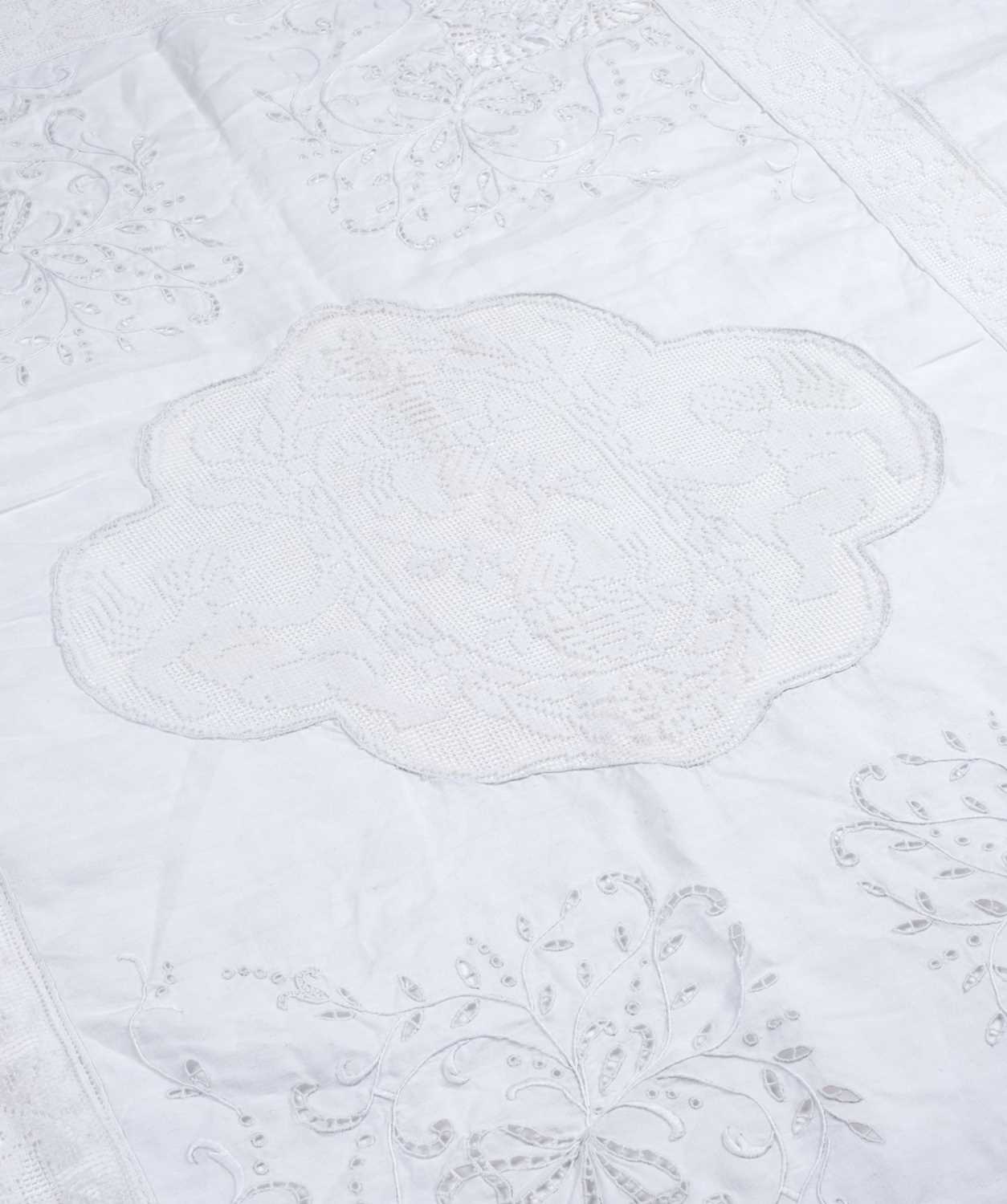 Lot 447 - Household Linen. A hand-worked filet lace and cutwork bedcover, French, circa 1900, & other items