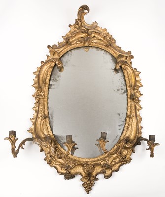 Lot 552 - Mirror. A fine 18th century rococo giltwood girondale mirror