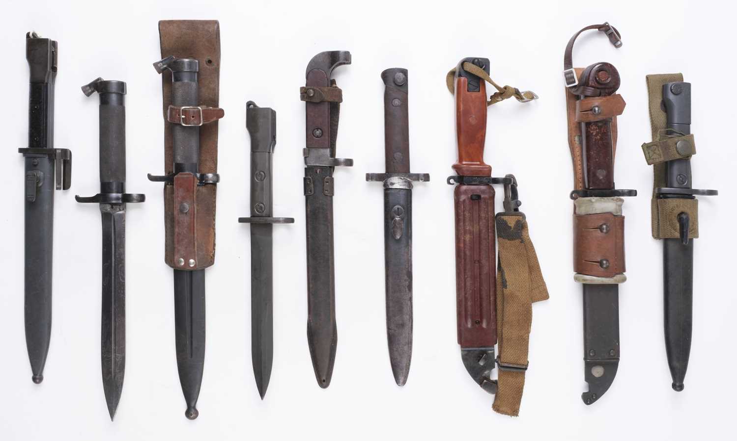 Lot 165 - Bayonets. A mixed collection, including S1 Uzi bayonet