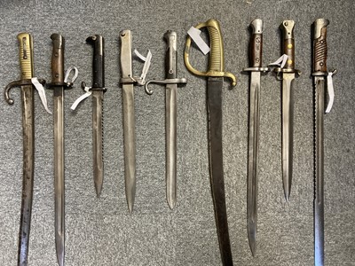 Lot 164 - Bayonets. A mixed collection, including German S98 Schutzruppe S.W.A. bayonet