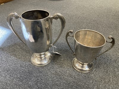 Lot 90 - Silver Trophies. A George V silver two handled trophy cup by Kemp Brothers, London, 1933