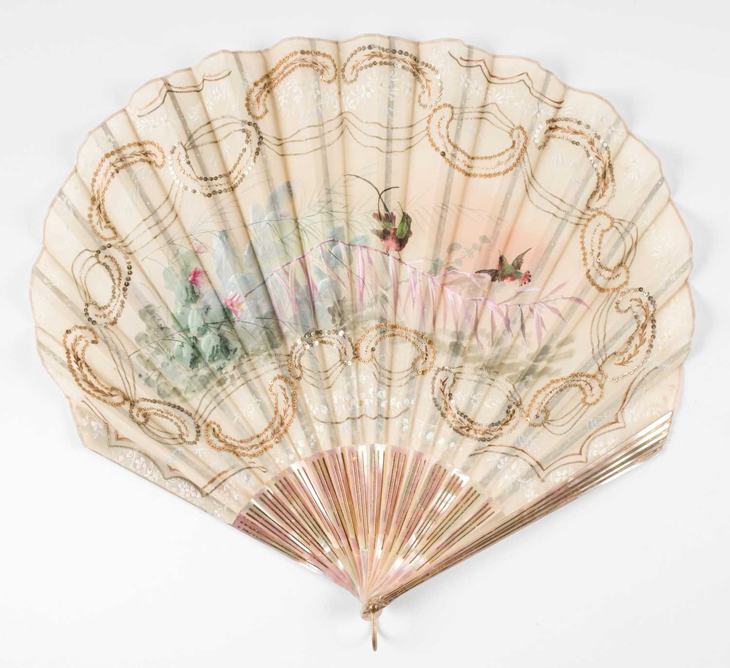 Lot 492 - Decorative Fan. A spangled painted fan,