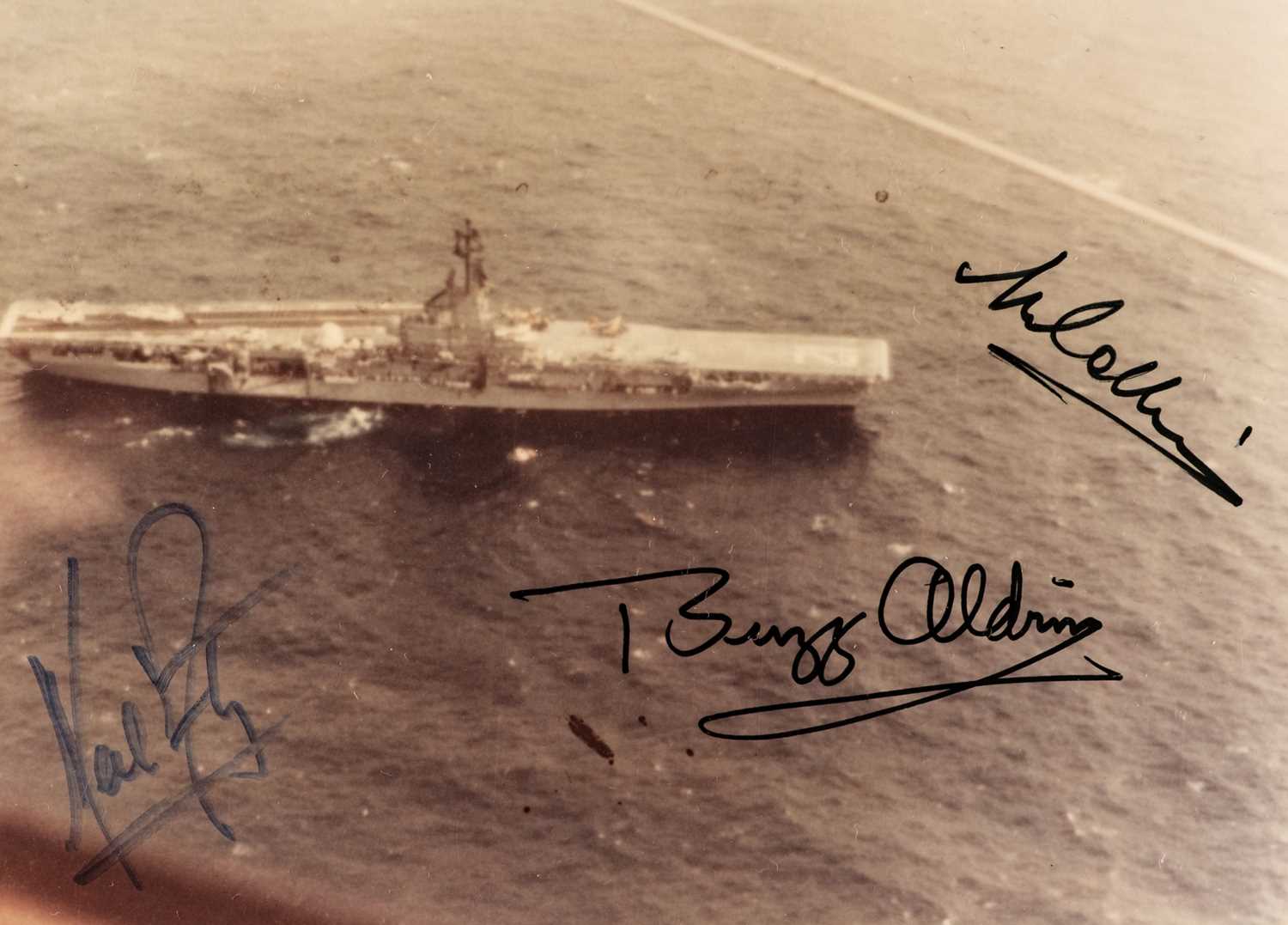 Lot 323 - Apollo 11. Photograph of the Apollo 11 recovery ship USS Hornet, signed by Armstrong, Aldrin and Collins