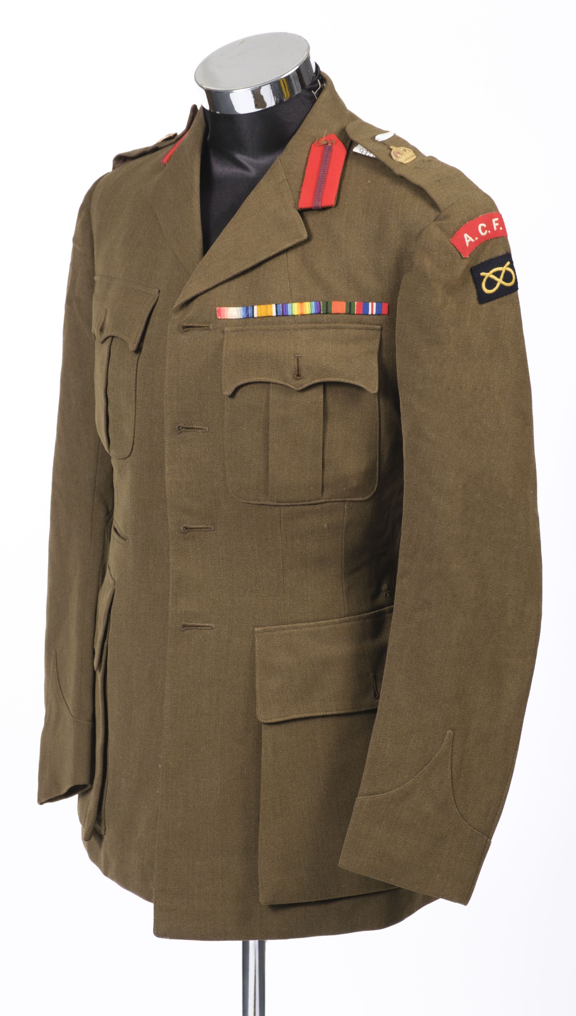 Lot 265 - Military Uniforms. A WWII officers' uniform