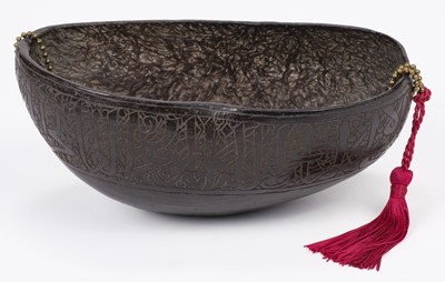 Lot 27 - Seychelles. A Coco de Mer seed (Lodoicea maldivica) converted to a Kashkul (Dervish's begging bowl)