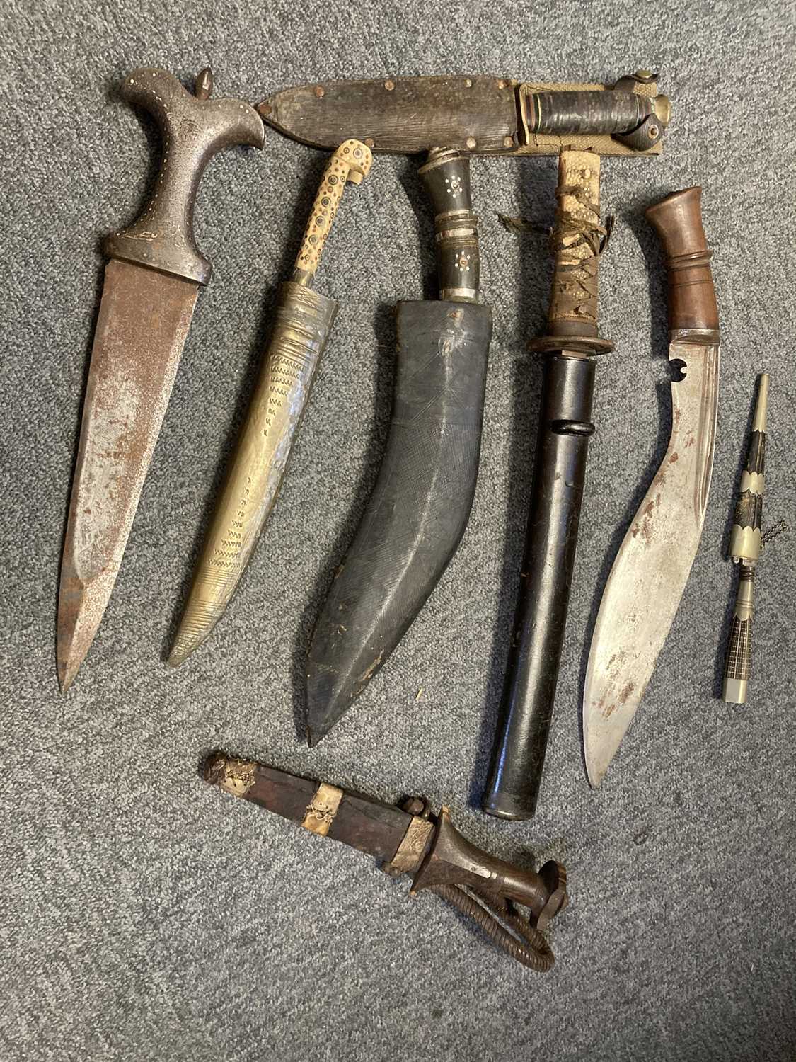 Lot 175 - Daggers. A Japanese tanto probably Edo period and other daggers