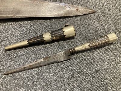 Lot 175 - Daggers. A Japanese tanto probably Edo period and other daggers