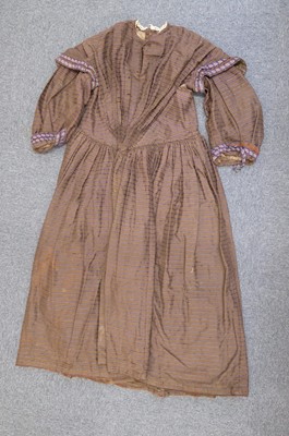 Lot 424 - Clothing. A muslin dress, 1830s, & 5 others