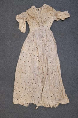 Lot 424 - Clothing. A muslin dress, 1830s, & 5 others