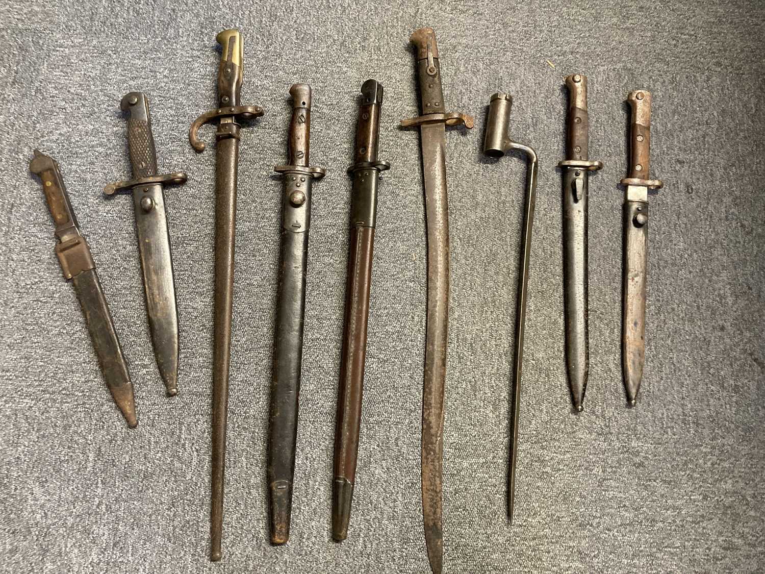 Lot 166 - Bayonets. A Victorian Martini Henry socket bayonet and other bayonets