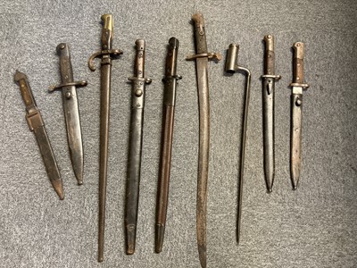 Lot 166 - Bayonets. A Victorian Martini Henry socket bayonet and other bayonets
