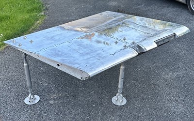Lot 408 - F-4 Phantom Jet. A table made from an F-4 Phantom wing flap