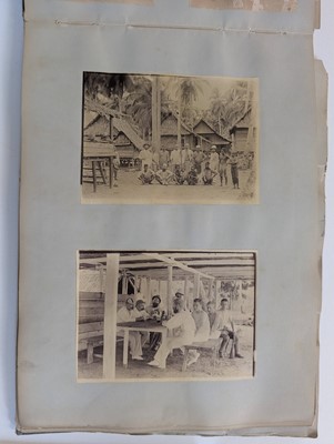 Lot 44 - Singapore. A partly broken album containing 35 albumen print photographs of Singapore