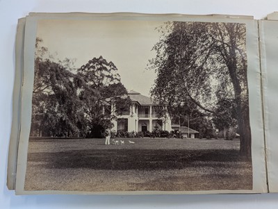 Lot 44 - Singapore. A partly broken album containing 35 albumen print photographs of Singapore