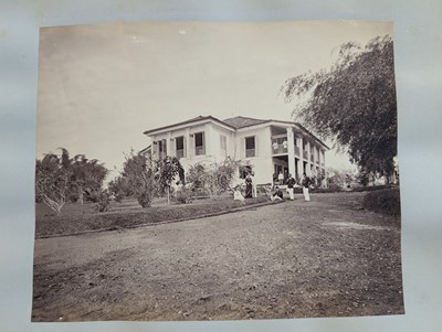 Lot 44 - Singapore. A partly broken album containing 35 albumen print photographs of Singapore