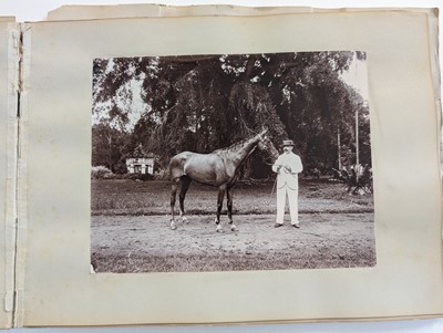 Lot 44 - Singapore. A partly broken album containing 35 albumen print photographs of Singapore