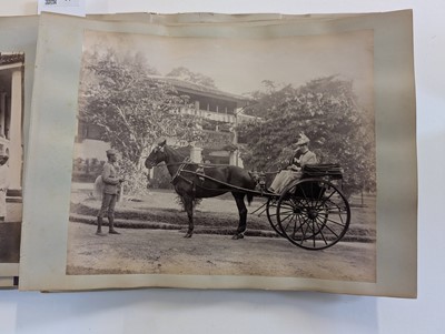 Lot 44 - Singapore. A partly broken album containing 35 albumen print photographs of Singapore