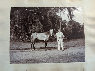 Lot 44 - Singapore. A partly broken album containing 35 albumen print photographs of Singapore