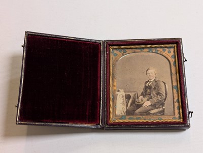 Lot 34 - Lowder Family. A quarter-plate daguerreotype of a young man in naval uniform