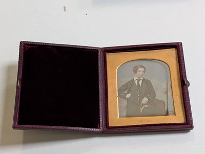 Lot 34 - Lowder Family. A quarter-plate daguerreotype of a young man in naval uniform