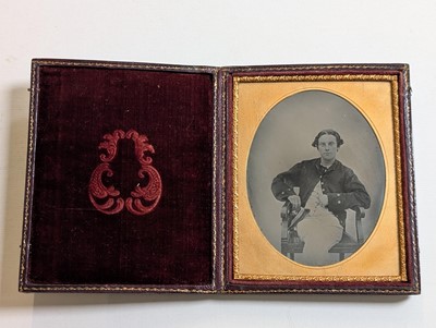 Lot 34 - Lowder Family. A quarter-plate daguerreotype of a young man in naval uniform